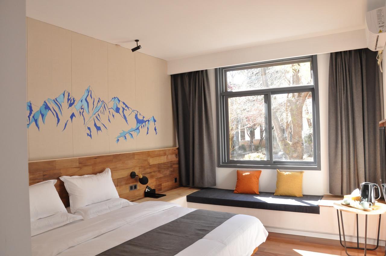 Lijiang Shuhe Travelling Hotel Экстерьер фото