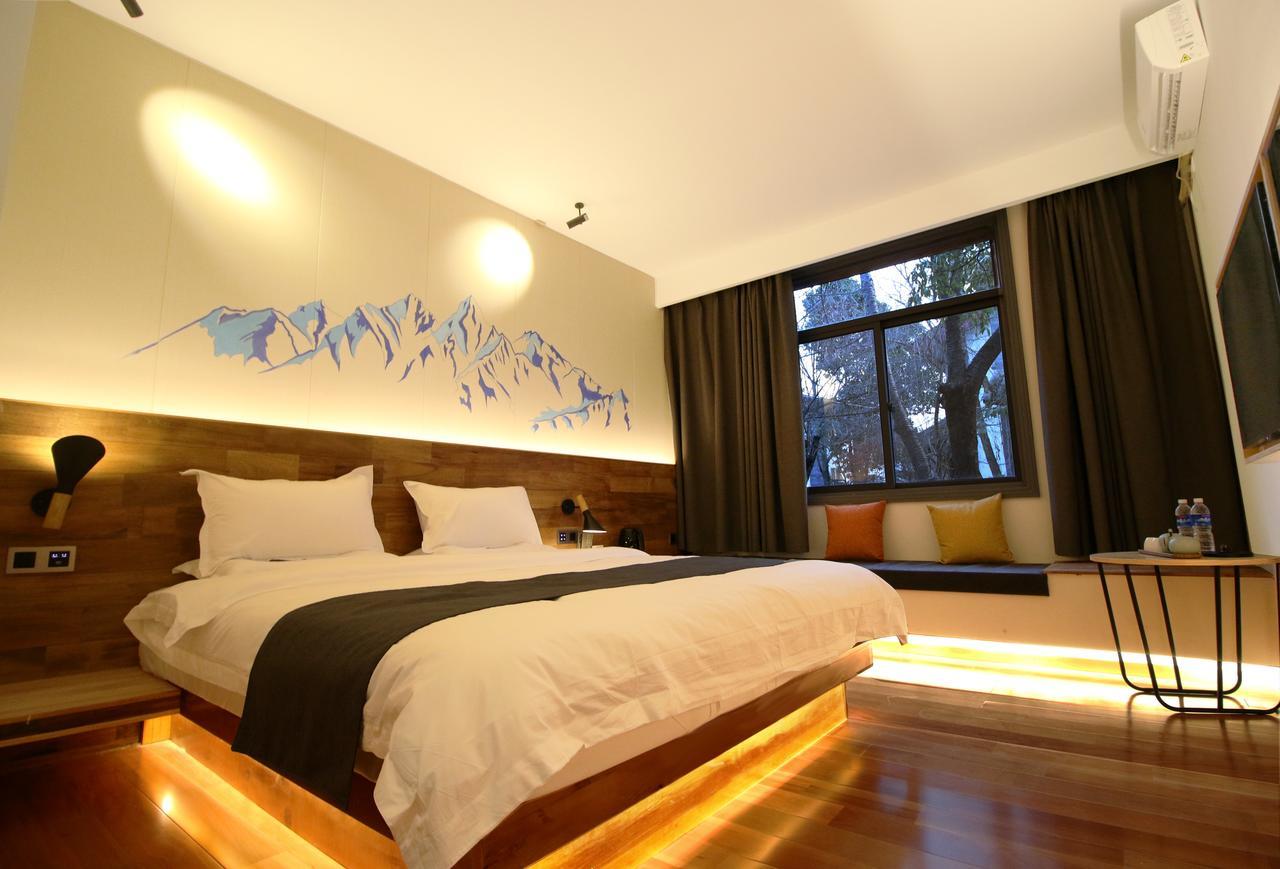 Lijiang Shuhe Travelling Hotel Экстерьер фото