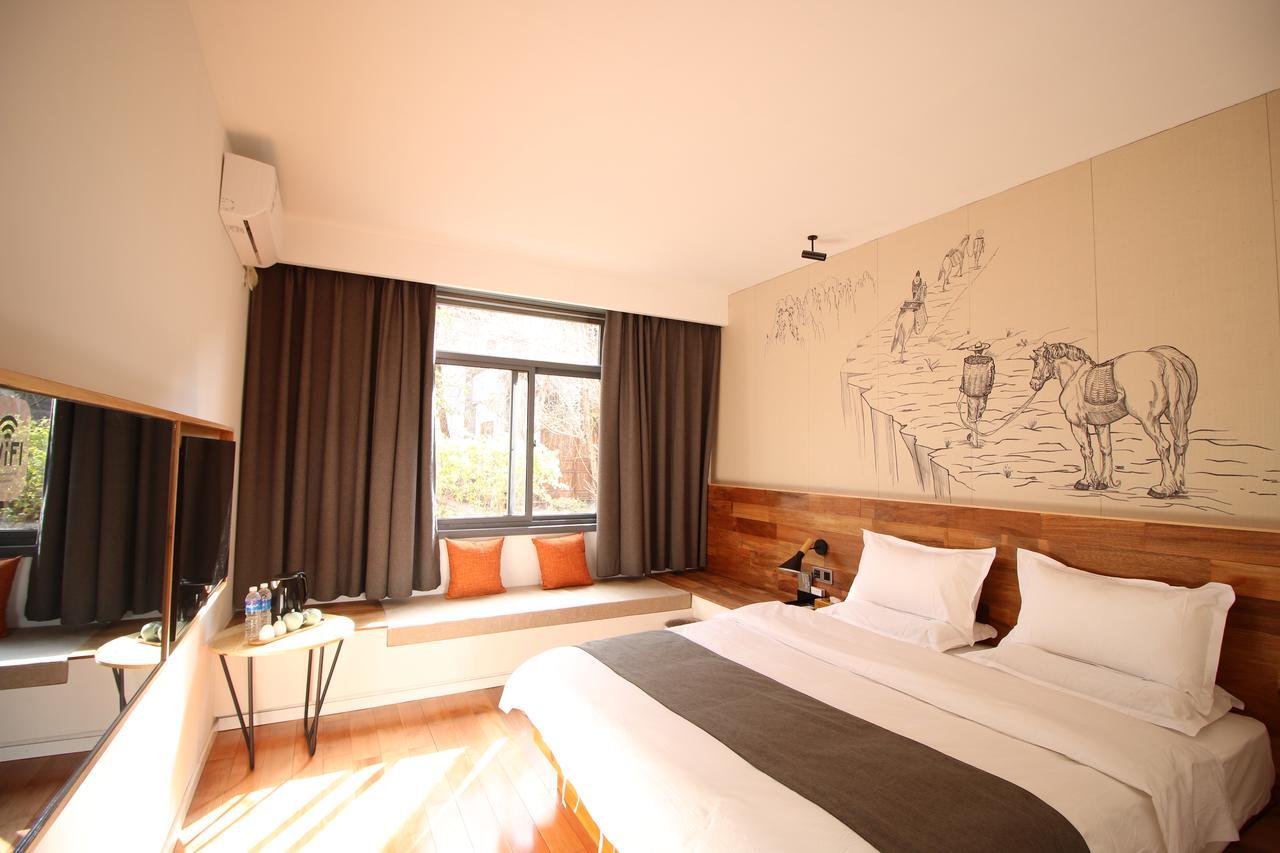 Lijiang Shuhe Travelling Hotel Экстерьер фото